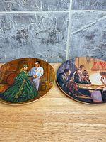 Both Knowles plates side by side showing full fronts and scale