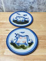 Both M.A. Hadley cow plates front view