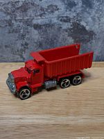 left-front view of red Hot Wheels dump truck