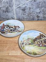 Both Royal Kent plates top view on wood surface