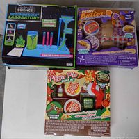 Front view of all three boxed kits
