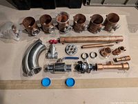Overview of all copper and stainless fittings laid out