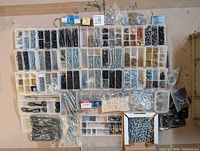 Overview of entire assortment in compartment boxes and bags