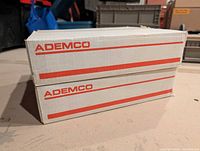 Two Ademco Vista-10EXse boxed enclosures stacked