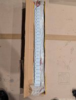 Box containing multiple rigid LED strips wrapped in bubble wrap