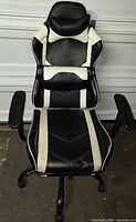 Front view of black and white gaming chair