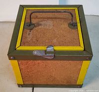 Top view showing cork lid, wire handle, metal latch