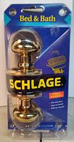 Front view of sealed Schlage Bed & Bath privacy knob set