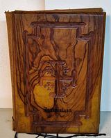 Front cover showing olive wood grain, carved cross, Jerusalem text