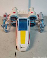 Top view of X-Wing Fighter showing overall design, colors, engines and cannons