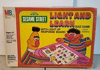 Front of boxed Sesame Street Light and Learn game