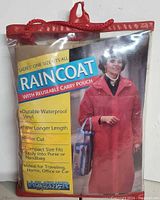 Front of packaged raincoat showing branding and product details