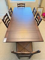 top view of dining table with six chairs around