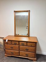 Front view of dresser with mirror attached