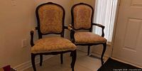 Pair of upholstered French Provincial armchairs