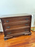 Front view of Gibbard mahogany three-drawer dresser
