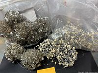 Bag with multiple silver sequin and ivory pearl beaded balls