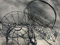 Top view of both wrought iron pieces showing overall form and rust patina