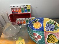 overview of bowl, decanter, loaf pan, two charm sets