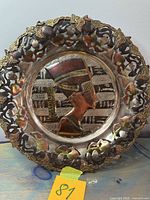 Full view of decorative copper and brass wall plate