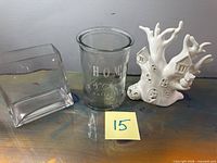 Square glass vase, cylinder jar, ceramic tree house luminary grouped