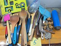 Full assortment of wooden, silicone and metal utensils laid out