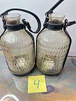 Pair of frosted textured glass lanterns side by side