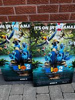 Both Rio 2 posters standing side by side showing full artwork and foam board mounting