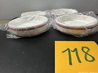 Set of 4 wrapped ramekins showing plum rim