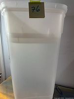 Full view of tall translucent storage bin