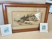 Overall lot showing large wood-framed print flanked by two small clip-framed prints