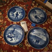 Group of four Royal Copenhagen blue plates dated 1965-1968