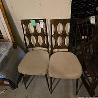 Front view of both chairs showing overall design, matching set