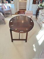 Table with tray sides folded flat