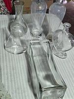 Group shot showing all six clear glass pieces