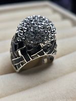 Front view showing rhinestone dome and lattice shank