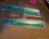 Both Hokey Spokes units showing mounting arms and circuitry