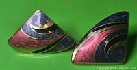 Front view of both triangular earrings showing enamel colors and design