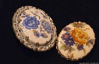 both brooches front view