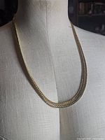 Necklace on form, full view front