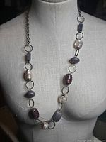 Full view of necklace on dress form