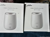 Front view of two boxed Pokitter PKT-HD200 diffusers