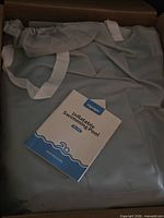 Folded pool with storage bag and manual inside box