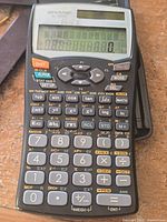 Front view of Sharp EL-520W calculator with keys and display