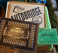 Large Autobridge board, tan lesson box, green travel set visible