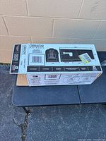 Factory box showing brand, model and illustrations