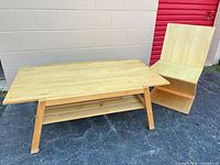 Coffee table and Z chair side by side for scale and style overview