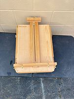 Closed Meeden wooden pochade box showing exterior and handle side