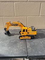 Full side view of SY-E511 yellow remote control excavator