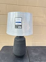 Full view of lamp with shade